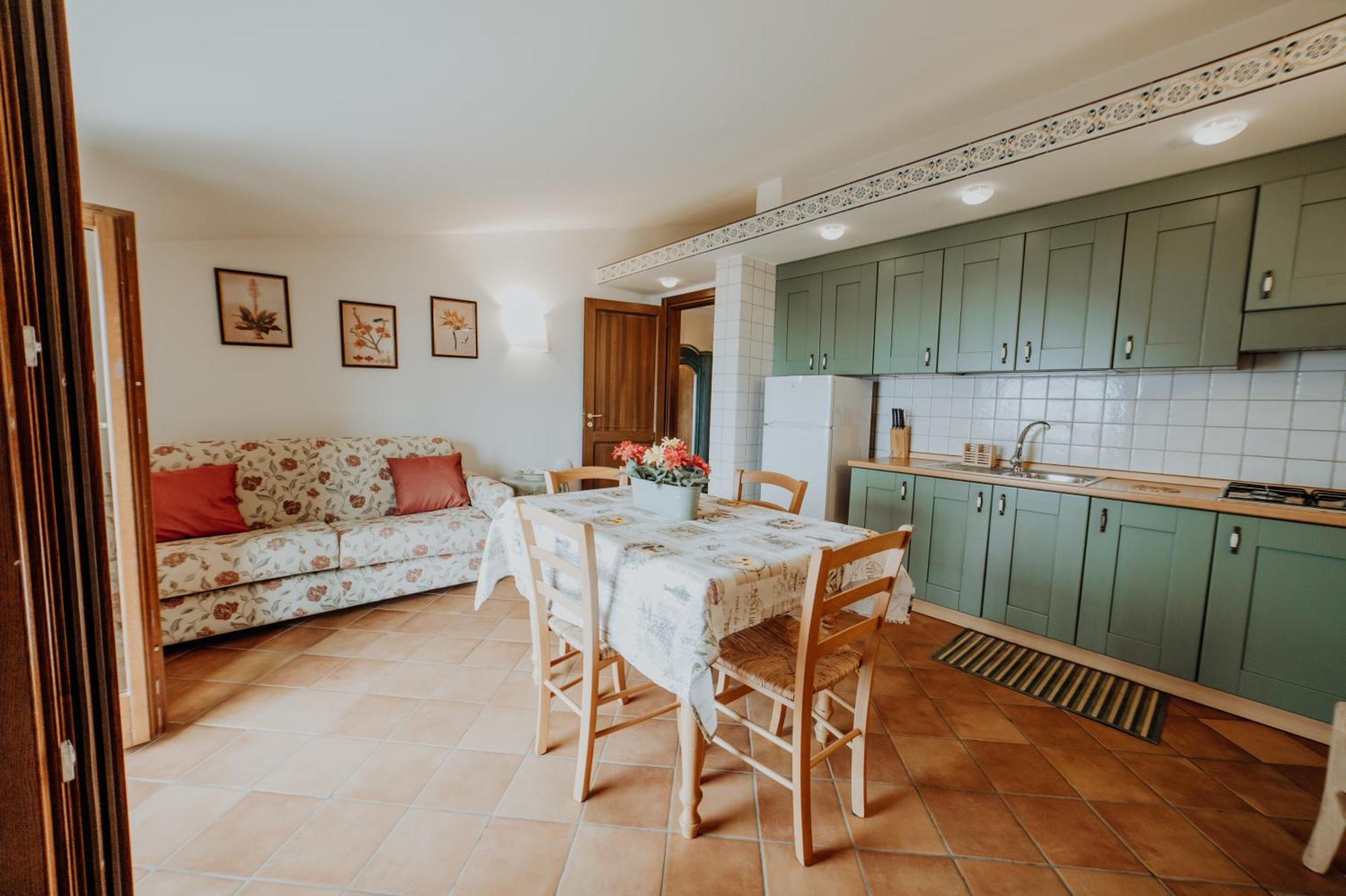 Residenza Golfo Degli Ulivi Aparthotel Caprioli Bagian luar foto